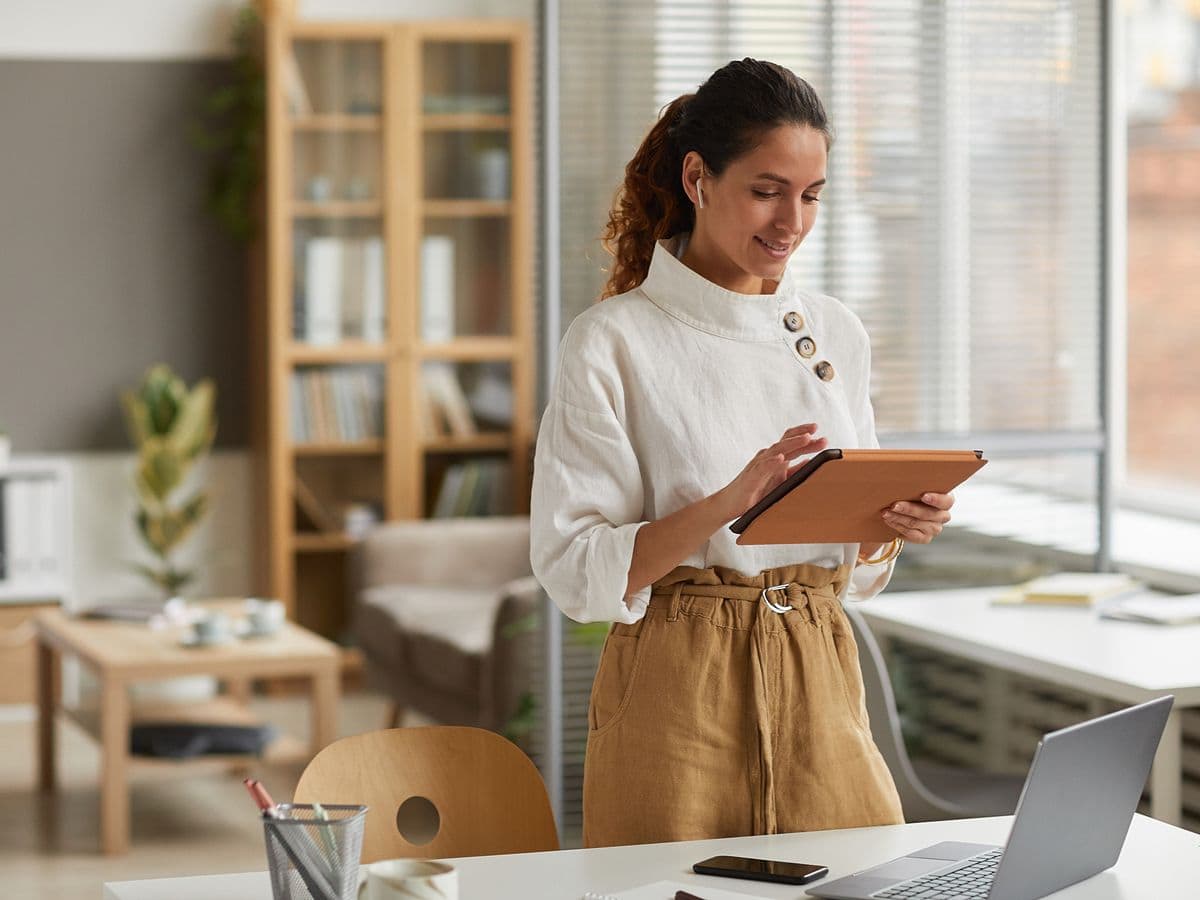 woman on computer learning about business finances